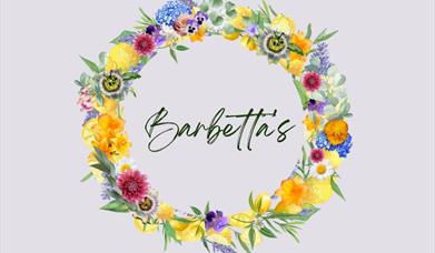 'Barbetta's' written in script font with a floral wreath surrounding 'Barbetta's'