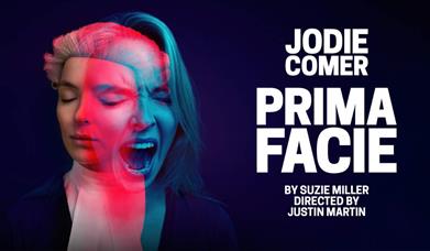 A poster for Prima Facie with two images of Jodie Comer overlapped in pink and blue on a dark blue background.