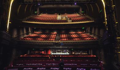 A theatre with tiered seats.